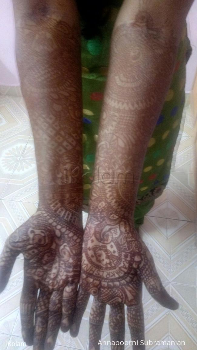 My bridal work on a client. - Bridal mehandi with bride and groom face.