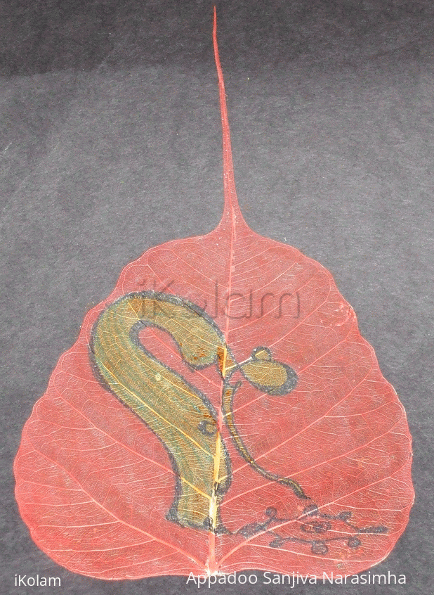 Rangoli: Lady making Rangoli