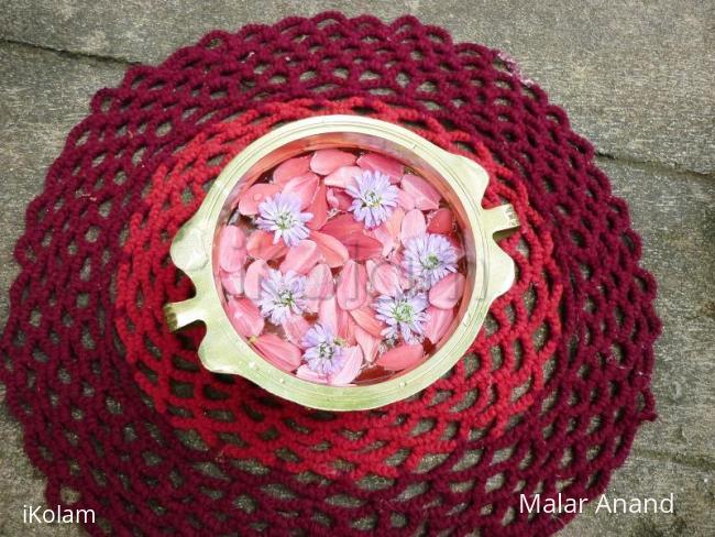 Rangoli: Kutty Flowers in a Kutty uruli Rangoli: Kutty Flowers in a Kutty uruli