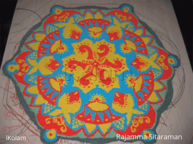 Rangoli: Yellow, red and blue rangoli