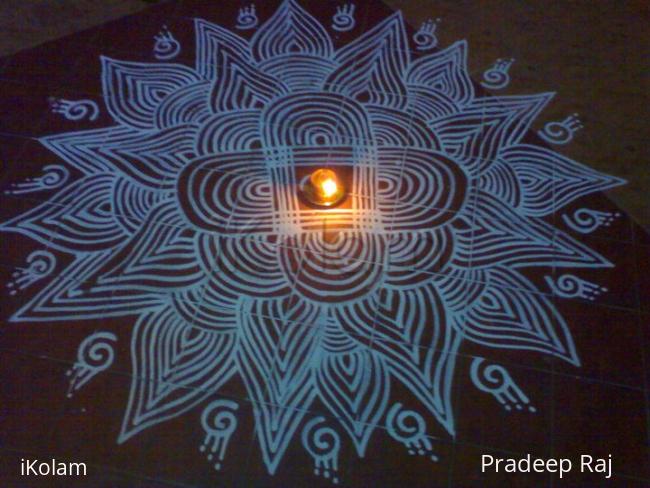 Rangoli: arisi mavu kolam Rangoli: arisi mavu kolam