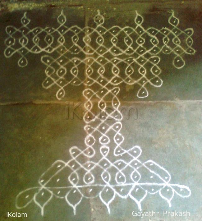Rangoli: Lamp in Chikku kolam Rangoli: Lamp in Chikku kolam