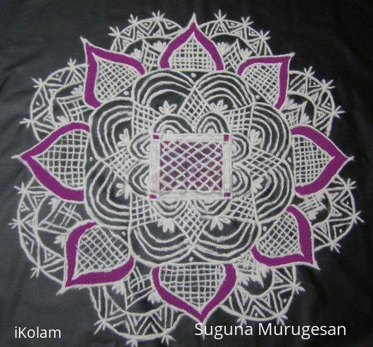 Rangoli: black board kolam Rangoli: black board kolam