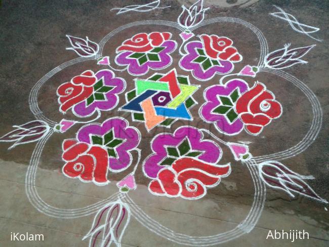 Rangoli: Sangu kolam with flowers Rangoli: Sangu kolam with flowers