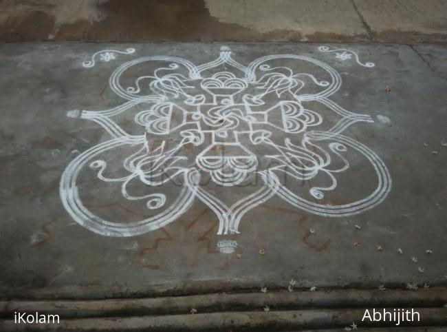 Rangoli: Swastik kolam with lotus 