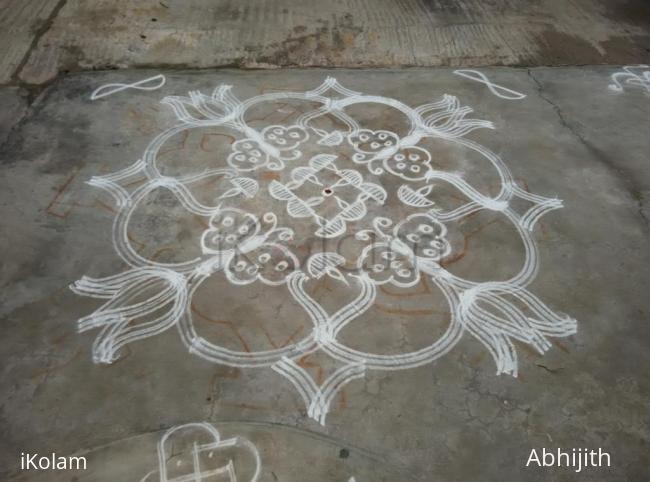 Rangoli: Butterflies with diyas Rangoli: Butterflies with diyas