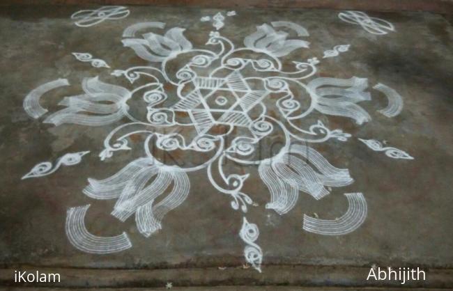 Rangoli: Sangu Kolam with peacocks Rangoli: Sangu Kolam with peacocks
