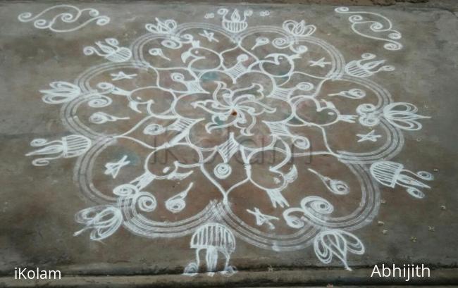 Rangoli: Floral rangoli  with peacocks 