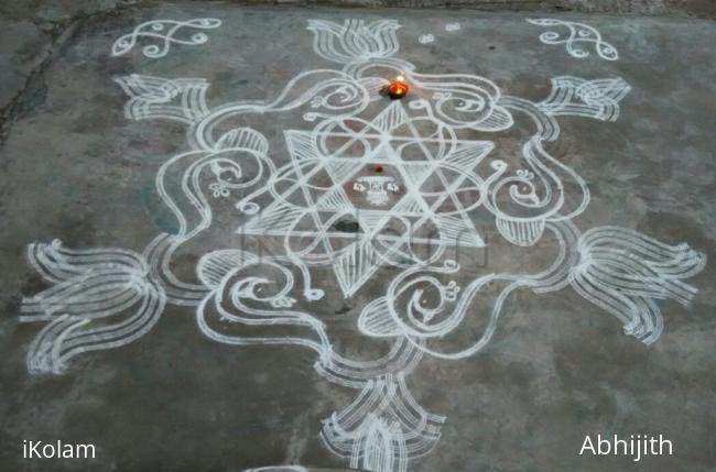 Rangoli: Peacocks form a sangu Rangoli: Peacocks form a sangu