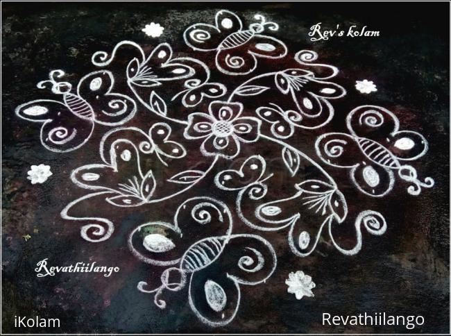 Rangoli: Rev's white butterfly kolam. Rangoli: Rev's white butterfly kolam.