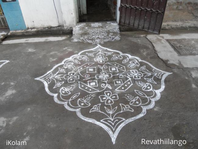 Rangoli: Kolam in white. Deepam kolam. Rangoli: Kolam in white. Deepam kolam.