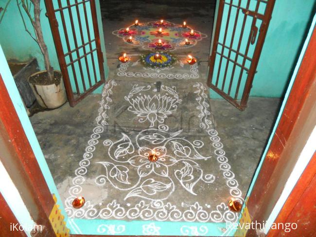 Rangoli: On karthigai, simple kolam with borders, poo decoration & kolam with deepam.