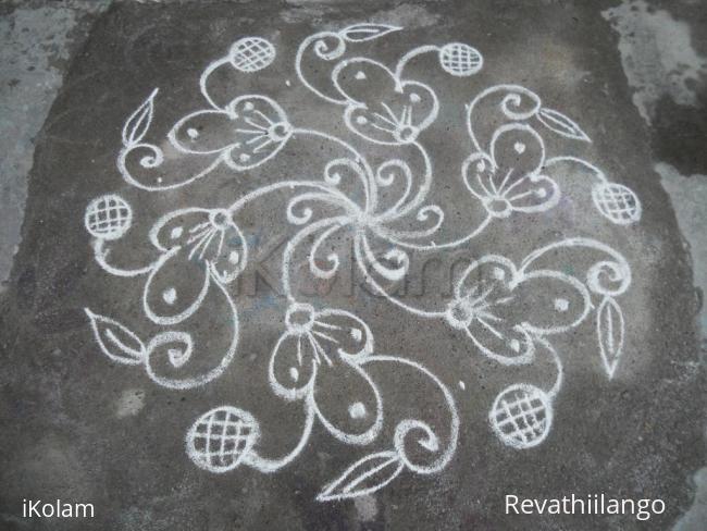 Rangoli: Kolam in white, daily kolam.