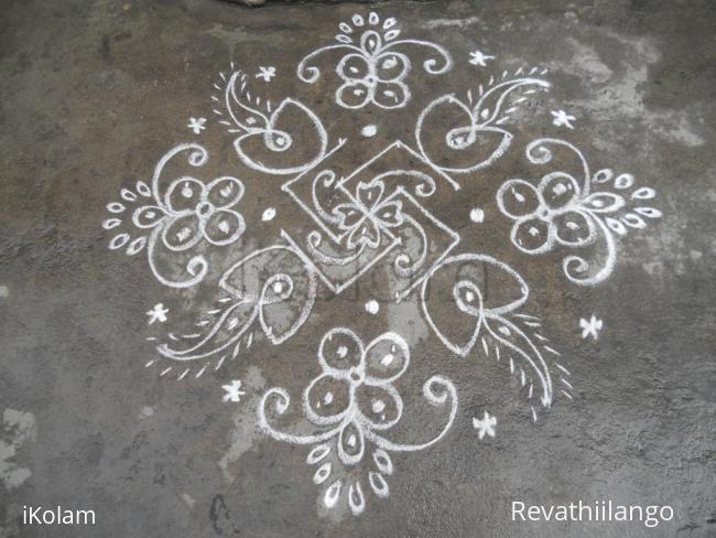 Rangoli: Swesthik deepam kolam. Rangoli: Swesthik deepam kolam.
