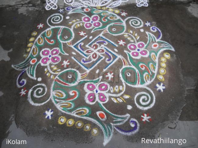 Rangoli: Rev's flowerparrot with swesthik, new try. Rangoli: Rev's flowerparrot with swesthik, new try.