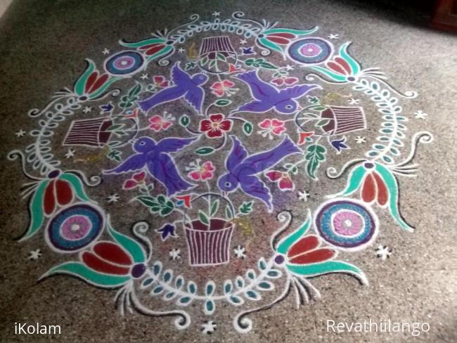 Rangoli: Rev's margazhi dew drop contest ' bird with basket kolam. Rangoli: Rev's margazhi dew drop contest ' bird with basket kolam.