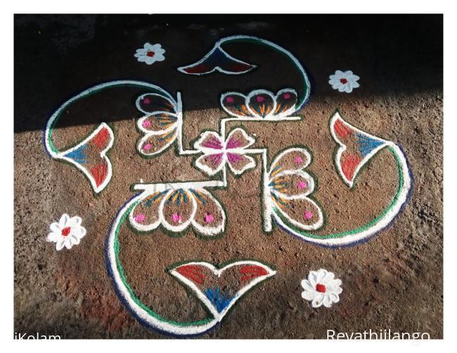 Rangoli: Rev's daily kolam in swastik. Rangoli: Rev's daily kolam in swastik.