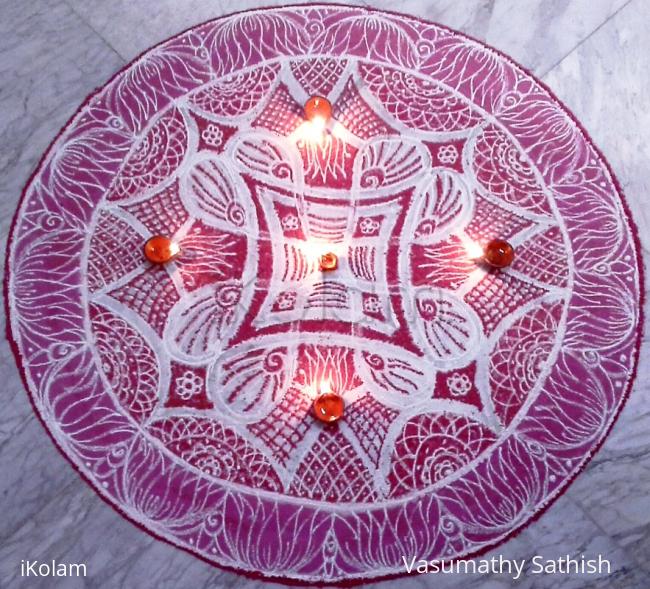Rangoli: Double stroke padi kolam for Panguni Uthiram with kolamavu and red colour.