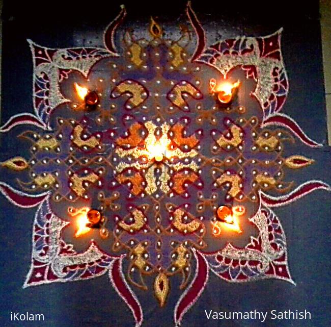 Rangoli: Chikku kolam with Diya Rangoli: Chikku kolam with Diya