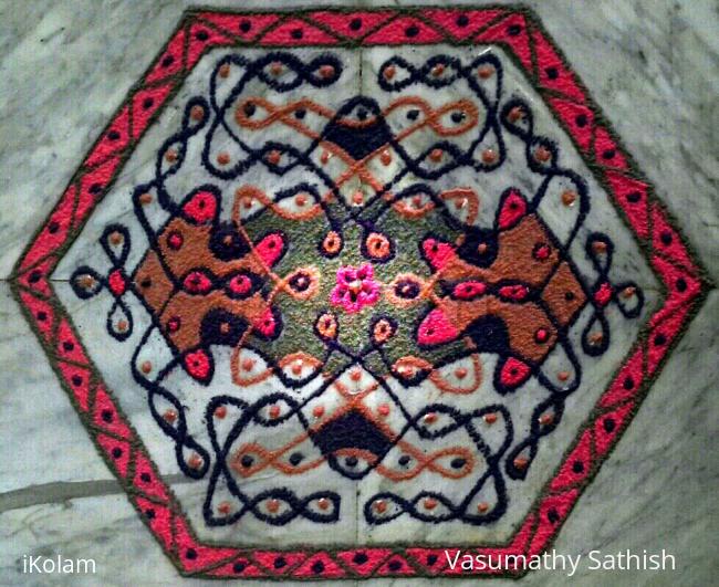 Rangoli: A butterfly chikku with 11-6 interlaced dots Rangoli: A butterfly chikku with 11-6 interlaced dots