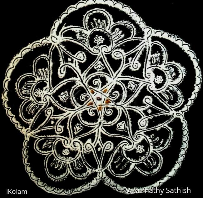 Rangoli: Pooja kolam with rice flour Rangoli: Pooja kolam with rice flour