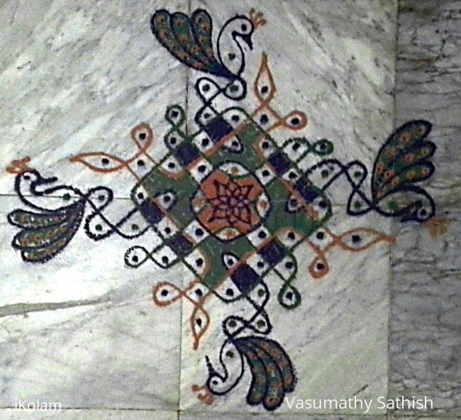 Rangoli: Simple chikku kolam with 11-1 straight dots Rangoli: Simple chikku kolam with 11-1 straight dots