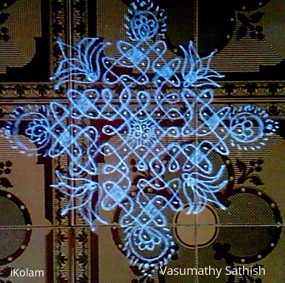 Rangoli: Chikku kolam with 13-1 straight dots. Rangoli: Chikku kolam with 13-1 straight dots.