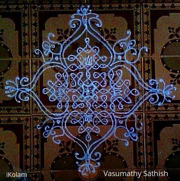 Rangoli: Chikku kolam with 13-1 straight dots. Rangoli: Chikku kolam with 13-1 straight dots.