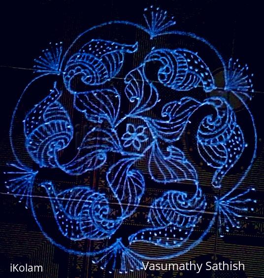 Rangoli: A flower with shell kolam 11-6 interlaced dots. Rangoli: A flower with shell kolam 11-6 interlaced dots.