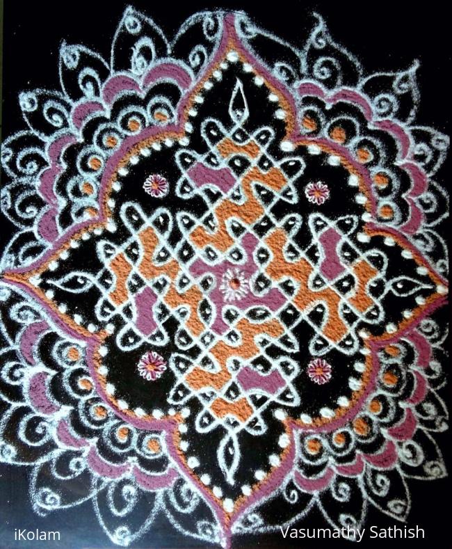 Rangoli: Chikku  kolam  with  13-1  straight  dots. 