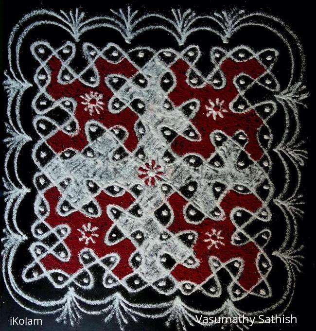 Rangoli: Chikku with red n white colours 