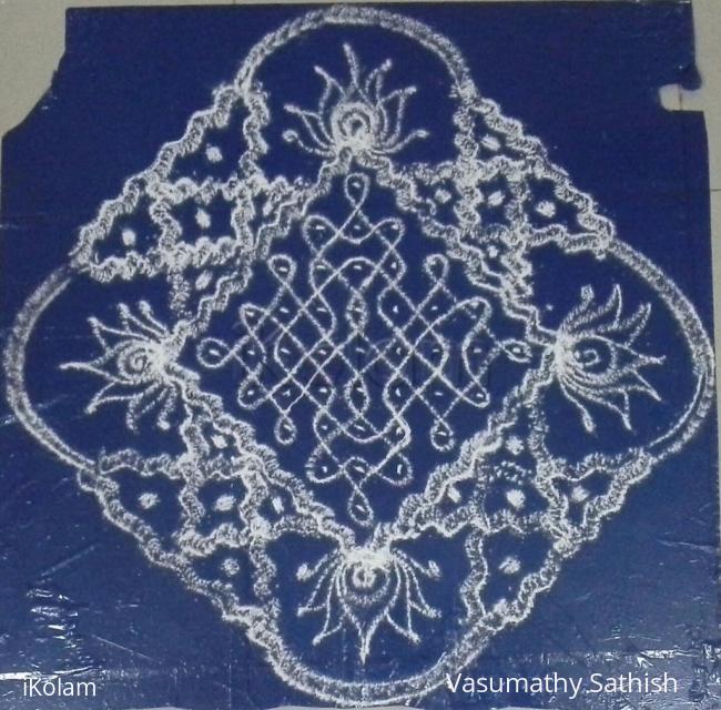 Rangoli: chikku kolam with 9-1 straight dots