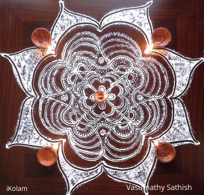 Rangoli: freehand kolam with rice flour Rangoli: freehand kolam with rice flour