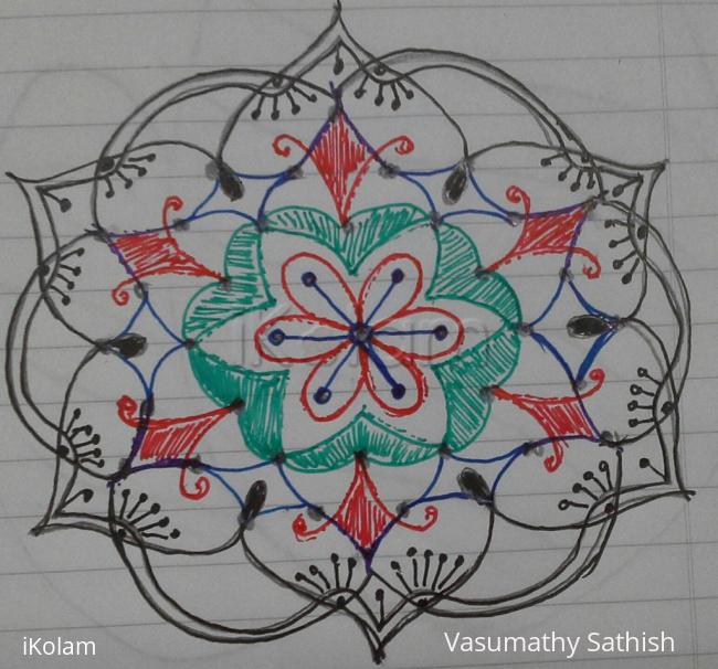 Rangoli: Dotted rangoli with 7-4 interlaced dots. Rangoli: Dotted rangoli with 7-4 interlaced dots.