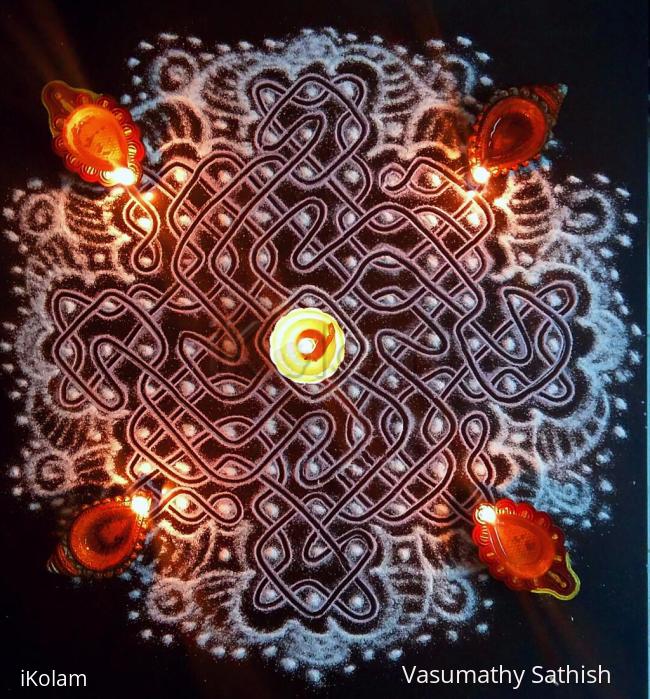 Rangoli: Spot designed Chikku Kolam with 9-9 straight dots  3 dots 2 lines in the middle on all sides
