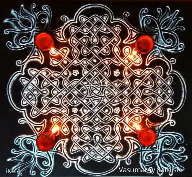 Rangoli: Day 2 Margazhi Kolam - A chikku kolam with 9-9 straight dots ; 5×2;3×1 on all sides in the centre Rangoli: Day 2 Margazhi Kolam - A chikku kolam with 9-9 straight dots ; 5×2;3×1 on all sides in the centre