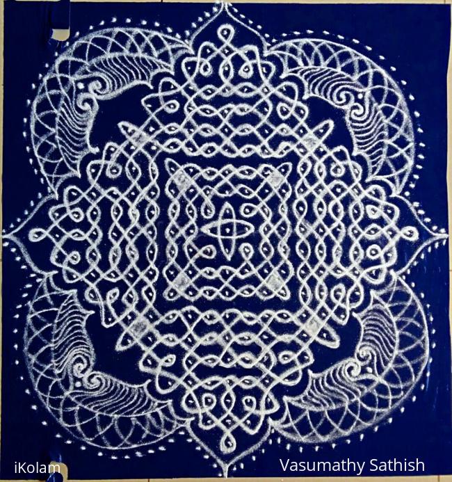 Rangoli: Margazhi Day 27 Kolam -  A  chikku pattern with 21-1 straight dots. 