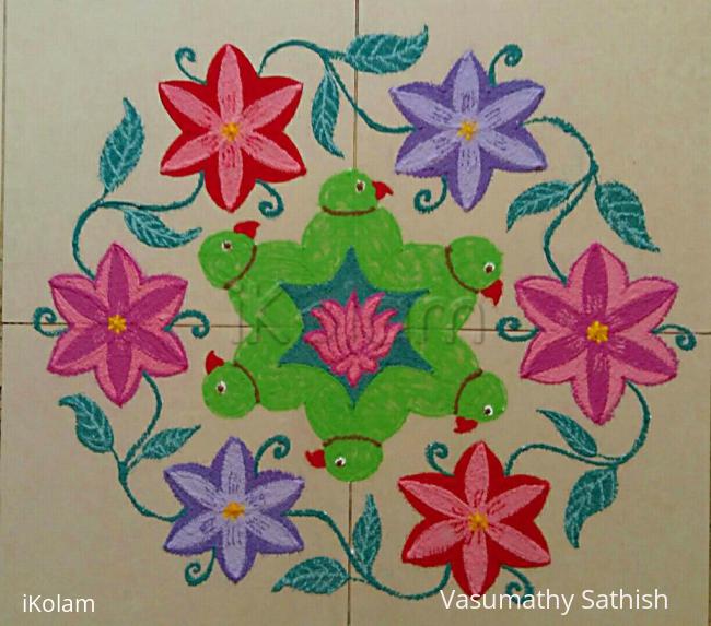 Rangoli: Margazhi Day 28 Kolam - A dotted parrot with flowers rangoli with 15-8 interlaced dots. Rangoli: Margazhi Day 28 Kolam - A dotted parrot with flowers rangoli with 15-8 interlaced dots.