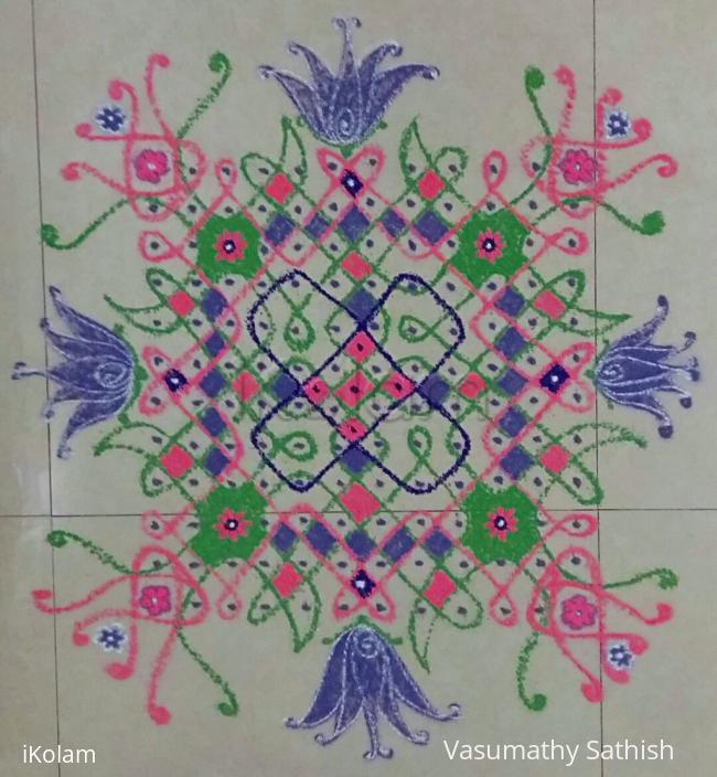 Rangoli: Chikku Kolam with 12-12 straight dots.