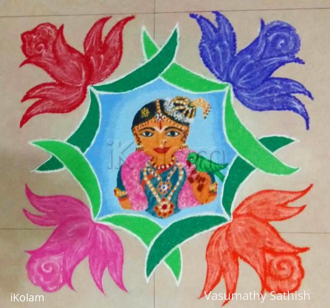 Andal rangoli with 10×10 straight dots.
