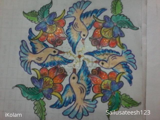 Rangoli: birds rangoli with flowers