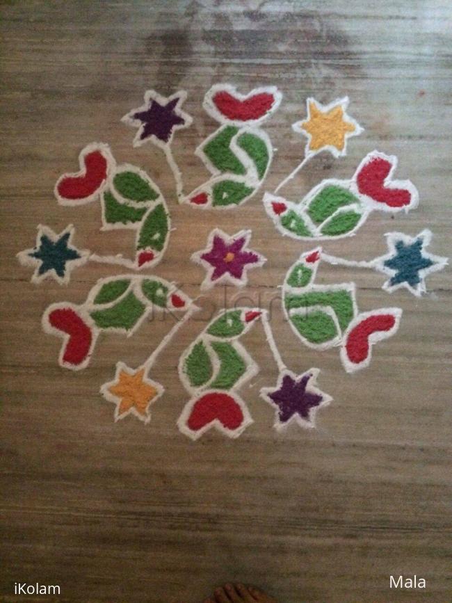 Rangoli: Parrot kolam