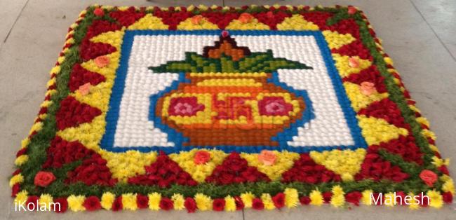 Rangoli: Devotional kolam mix of kumil, and flowers