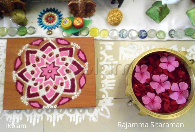 Rangoli: Hrudhayakamalam and flowers Rangoli: Hrudhayakamalam and flowers